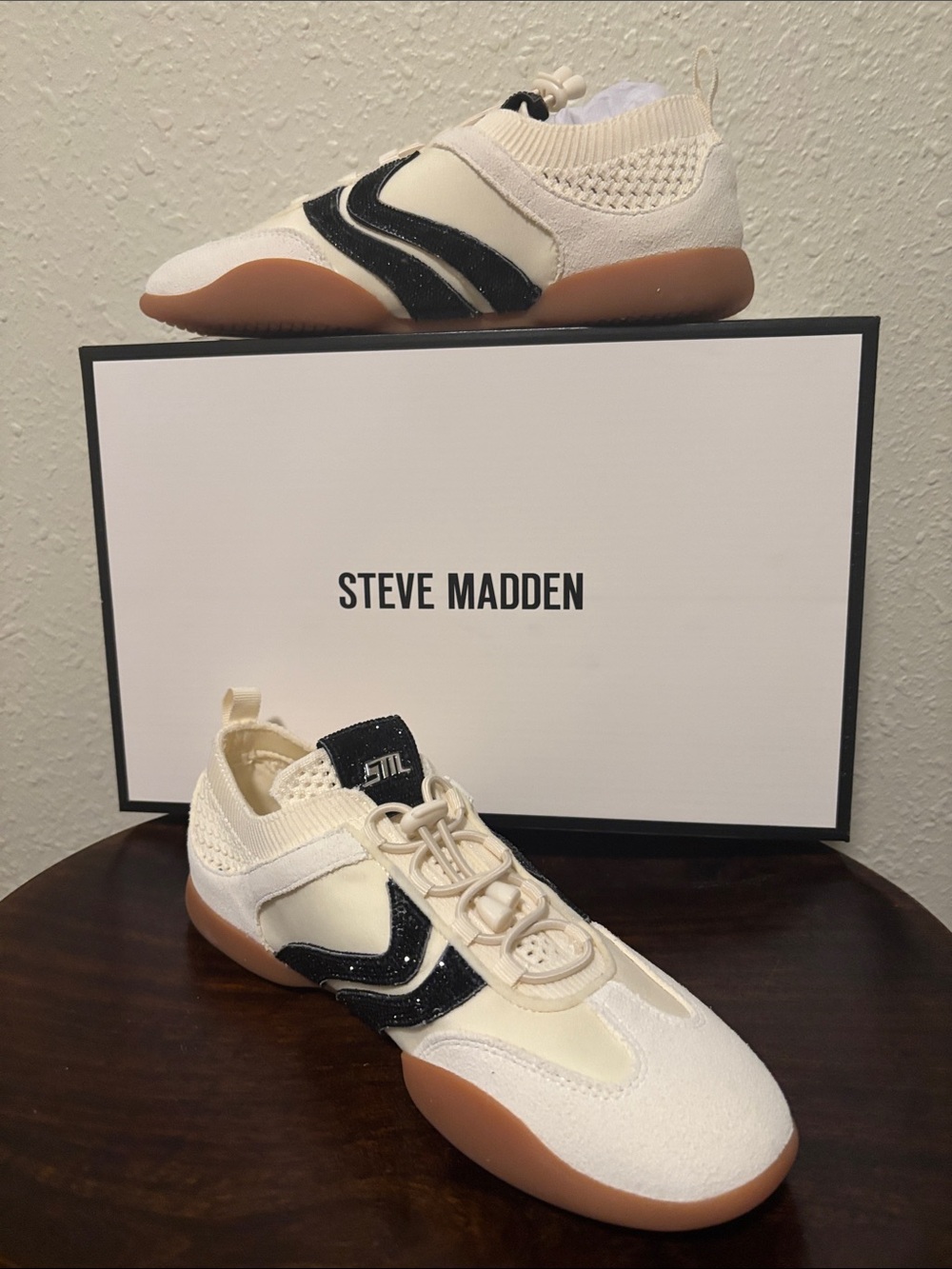 Steve Madden Cream Sneakers with Black Accents and Gum Sole